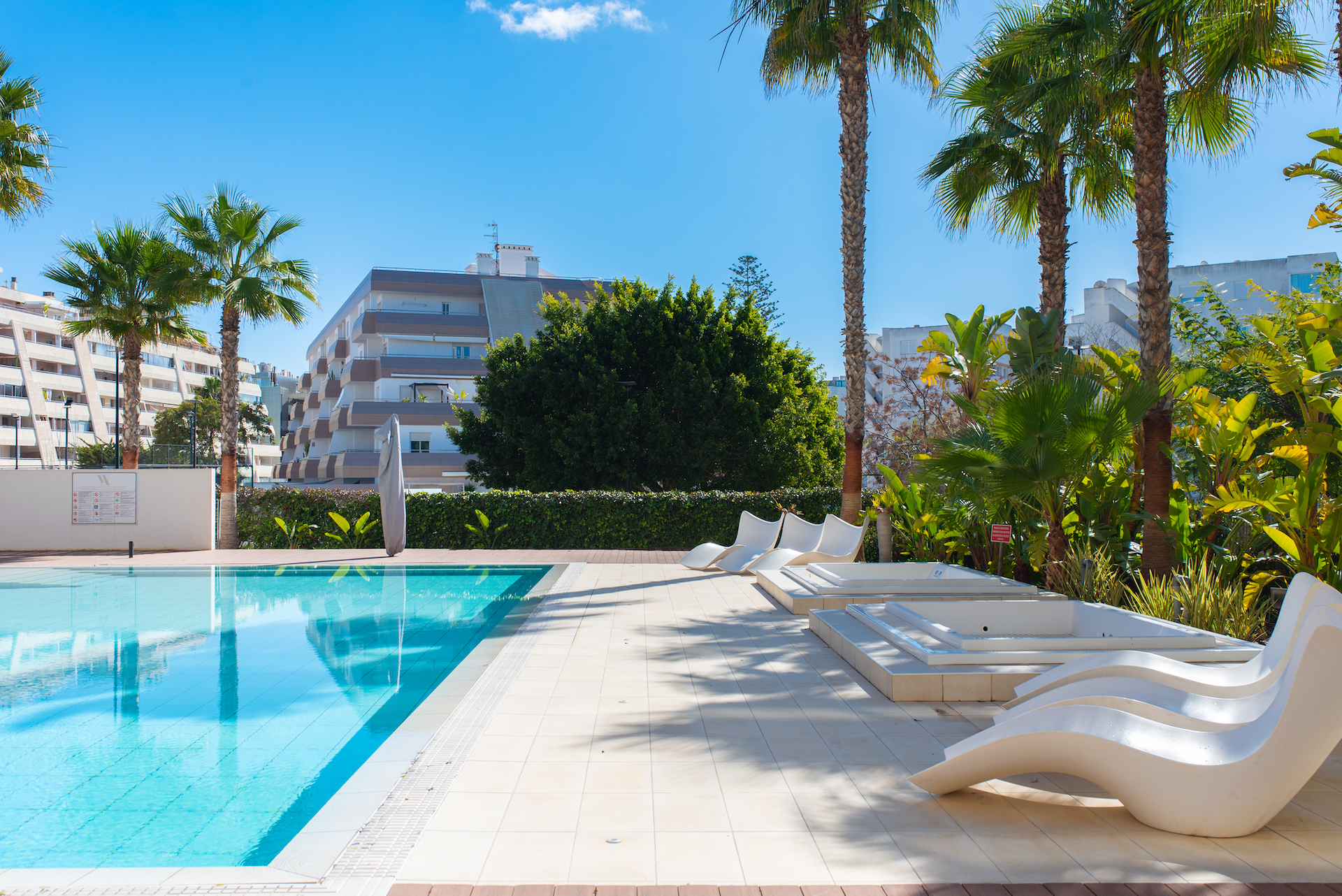Resa Estates apartment for sale in Ibiza marina botafoch modern pool 3.jpg